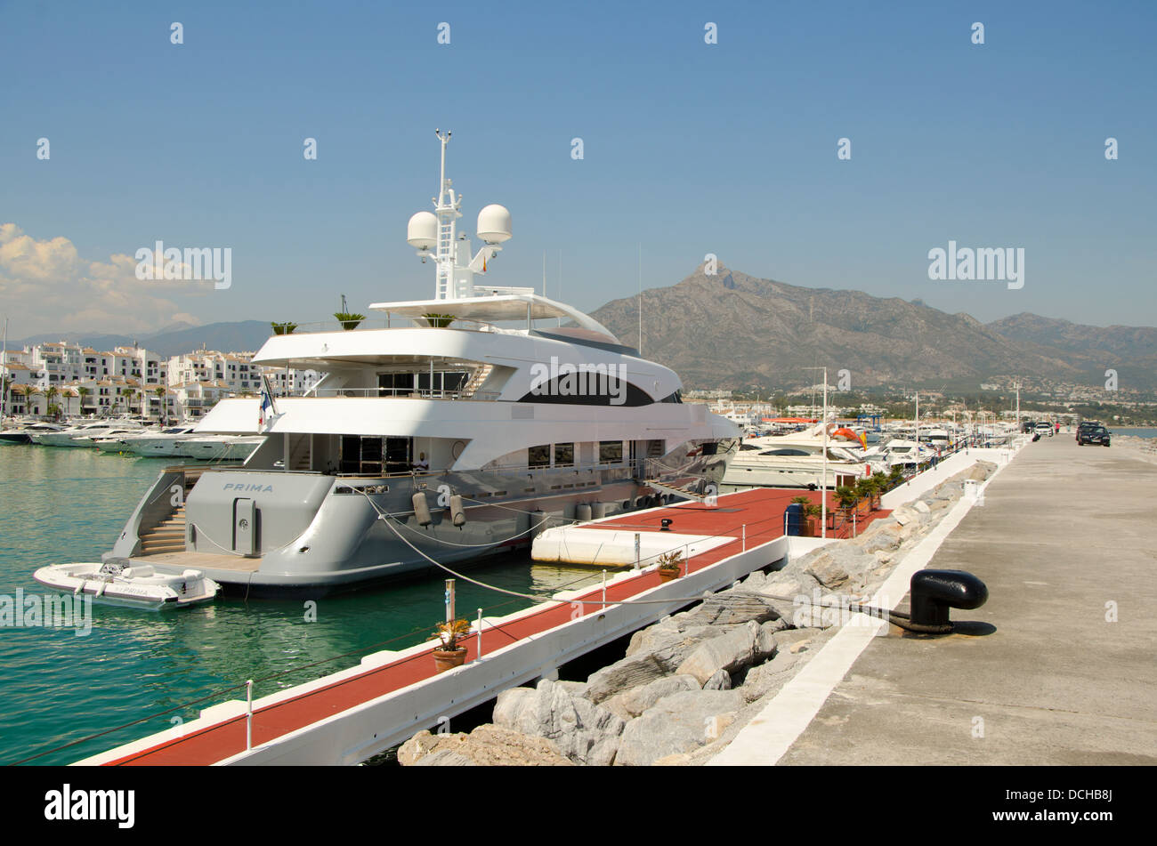 Luxury super-yacht 'prima' in the marina of Puerto Banus in Marbella with La concha mountain in background Stock Photo
