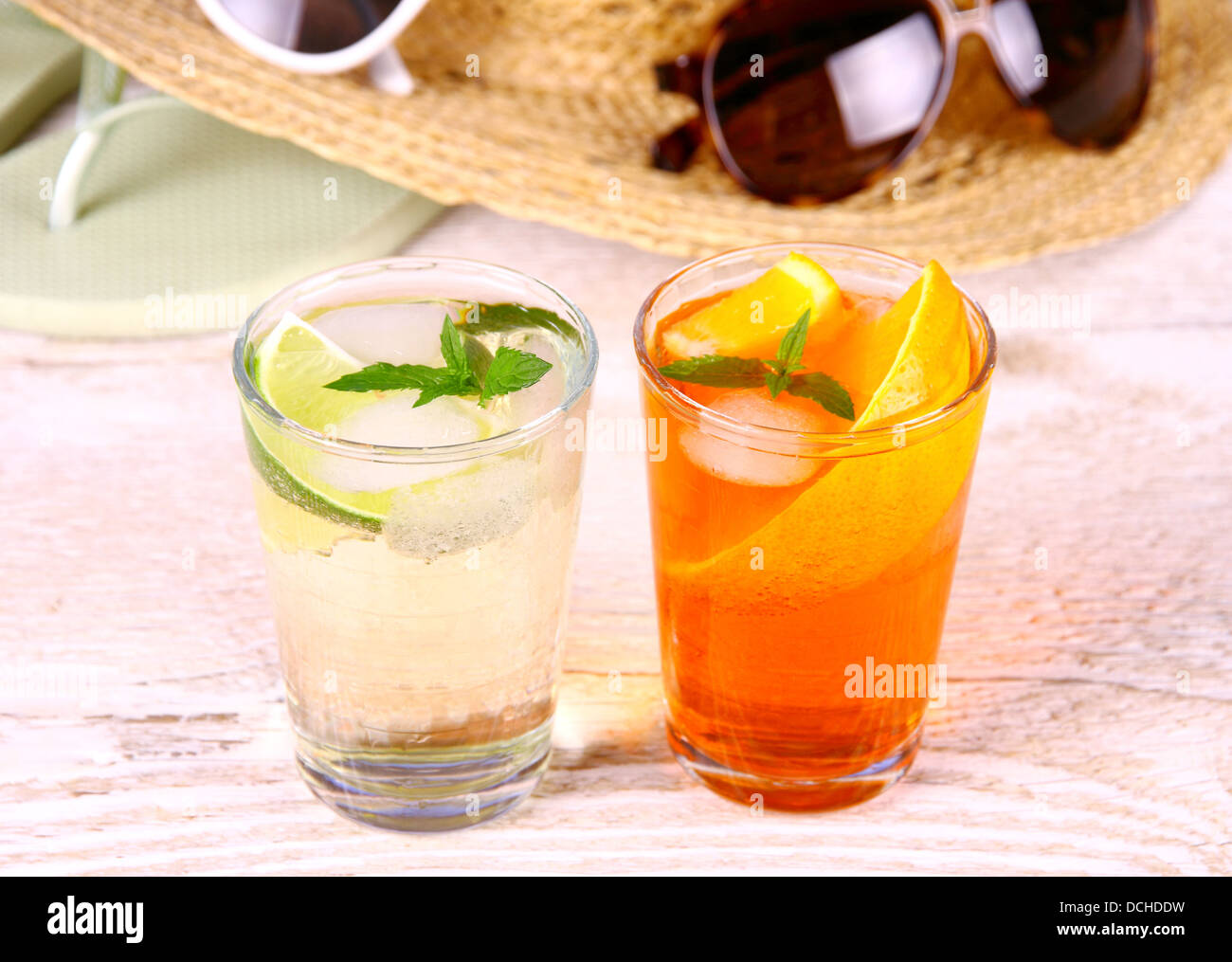 Mojito and orange cocktails with holiday background, close up Stock Photo