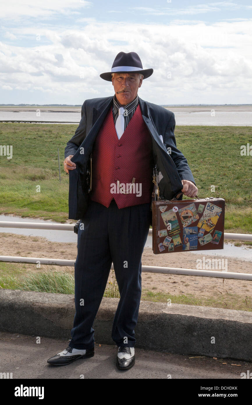 Simon Carter a Spiv, from Tarleton a re-enactor spivs wearing suit period costume at Lytham 1940's Wartime Festival held on Lytham Green, Lancashire, UK. Stock Photo
