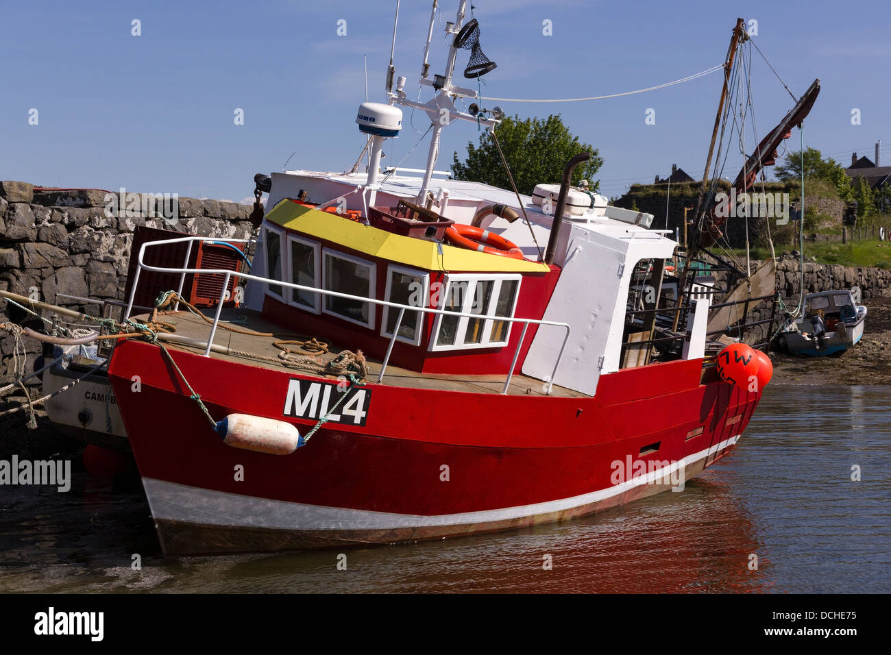 Modern small red and white fishing boat / trawler moored at Broadford Pier,  Broadford, Isle of Skye, Scotland, UK Stock Photo - Alamy