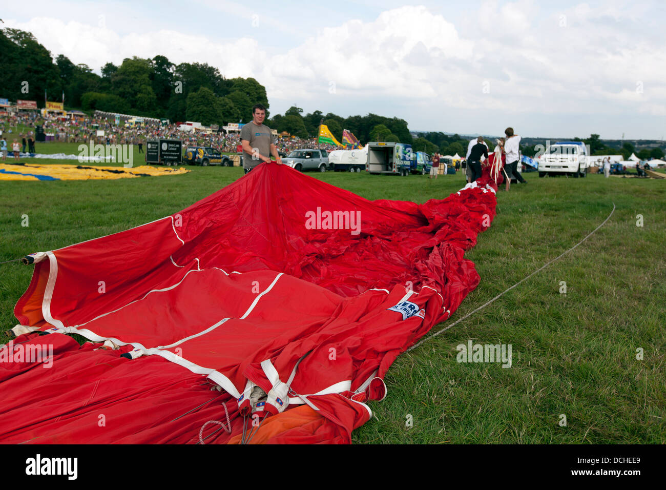 Balloons laid out in preparation for inflation at the 35th Bristol International Balloon Fiesta. Bristol, England, UK. Stock Photo