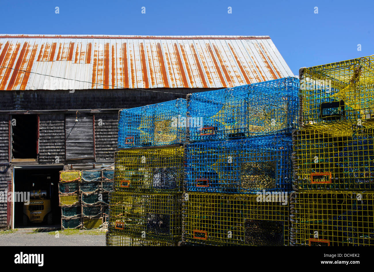 Herring fish stand with lobster traps at Seal Cove Stock Photo Alamy