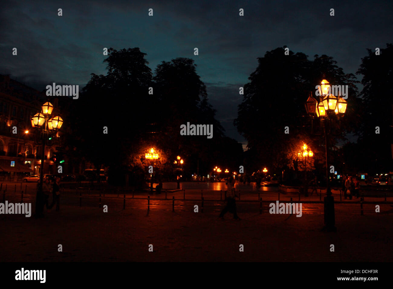 illuminated street of night Lvov city with many lanterns Stock Photo