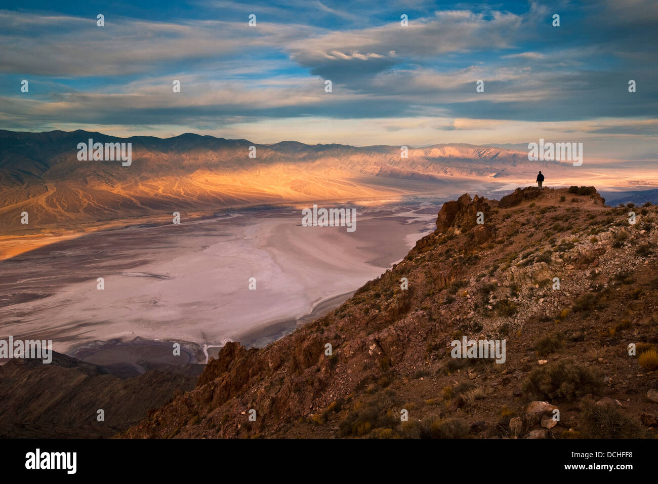 Tourist overlooking Panamint Mountains over Badwater Basin, from Dantes View, Death Valley National Park, California Stock Photo