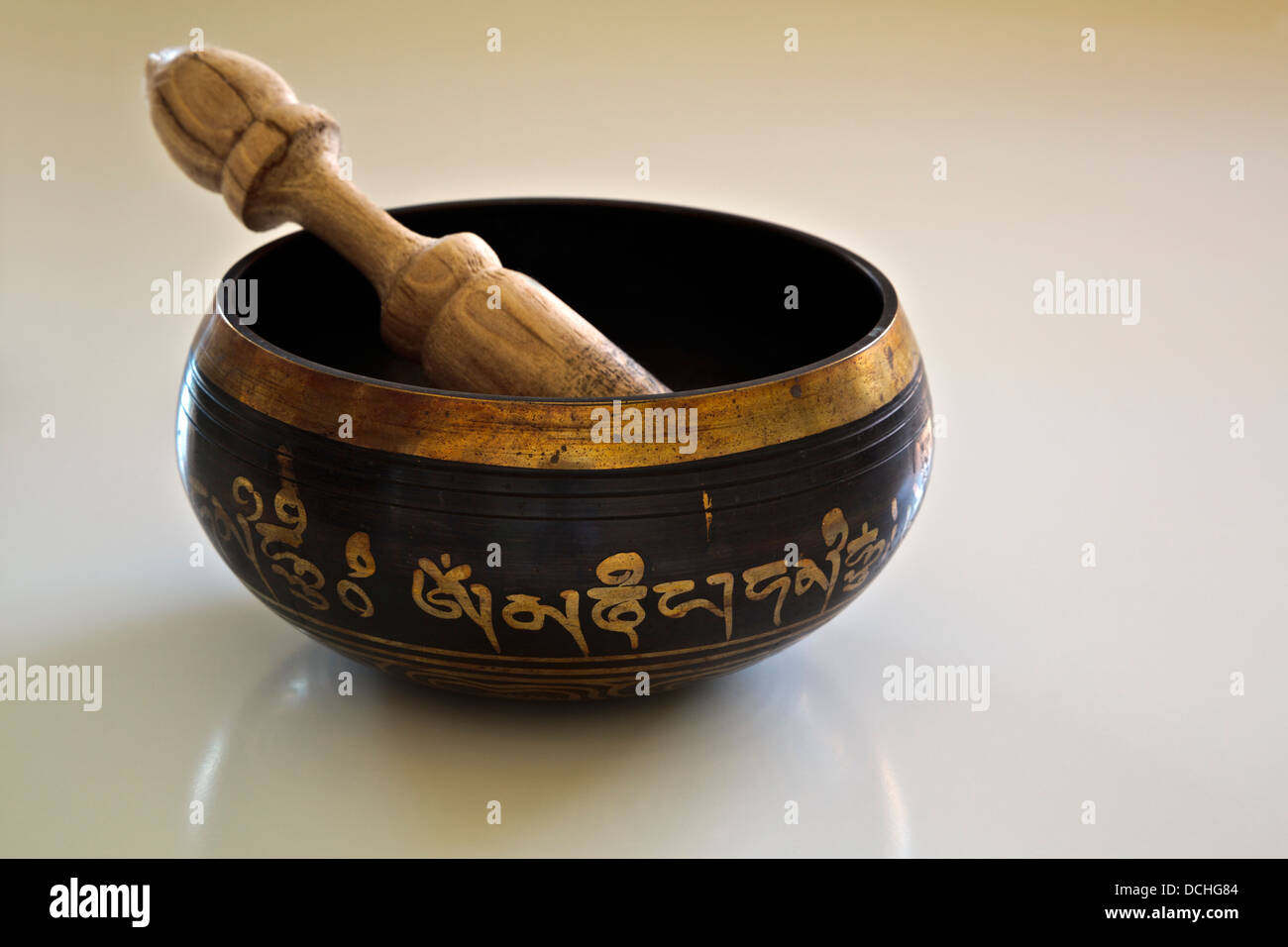 Tibetan Buddhist Singing Bowl with religious mantra Stock Photo