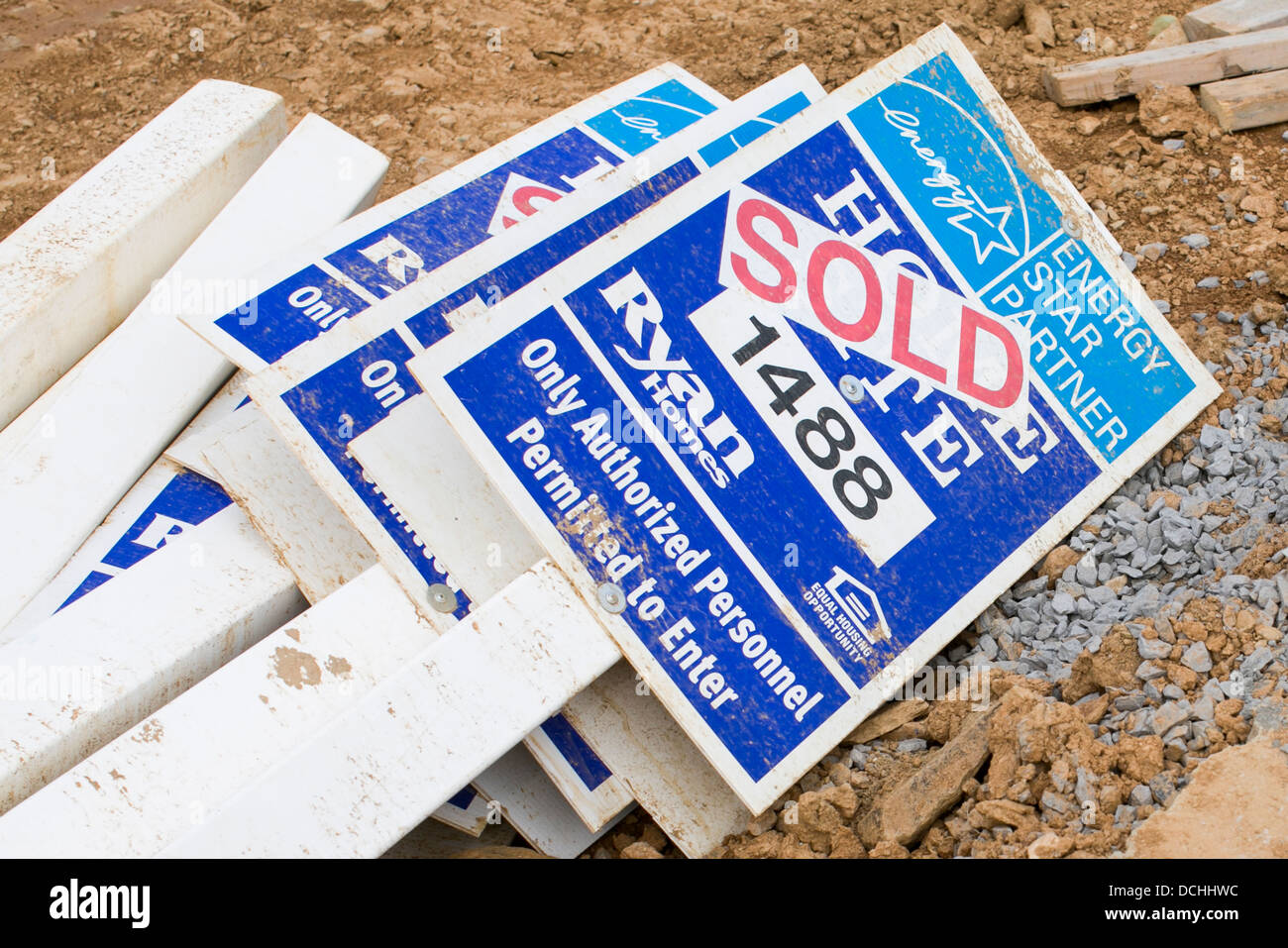 Ryan Homes 'Sold' signs in a new housing development.  Stock Photo