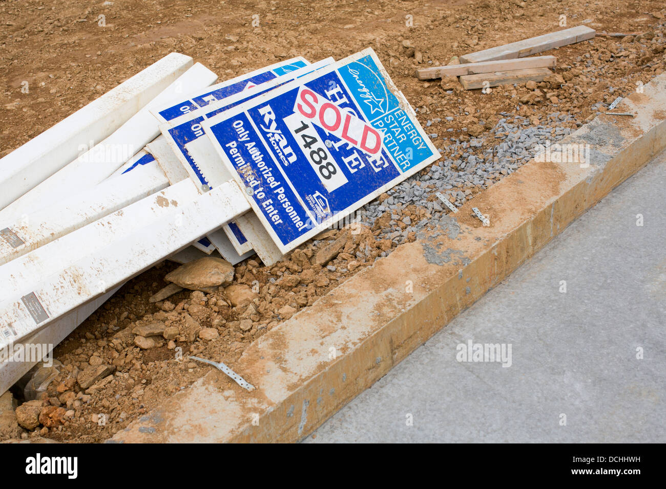 Ryan Homes 'Sold' signs in a new housing development.  Stock Photo