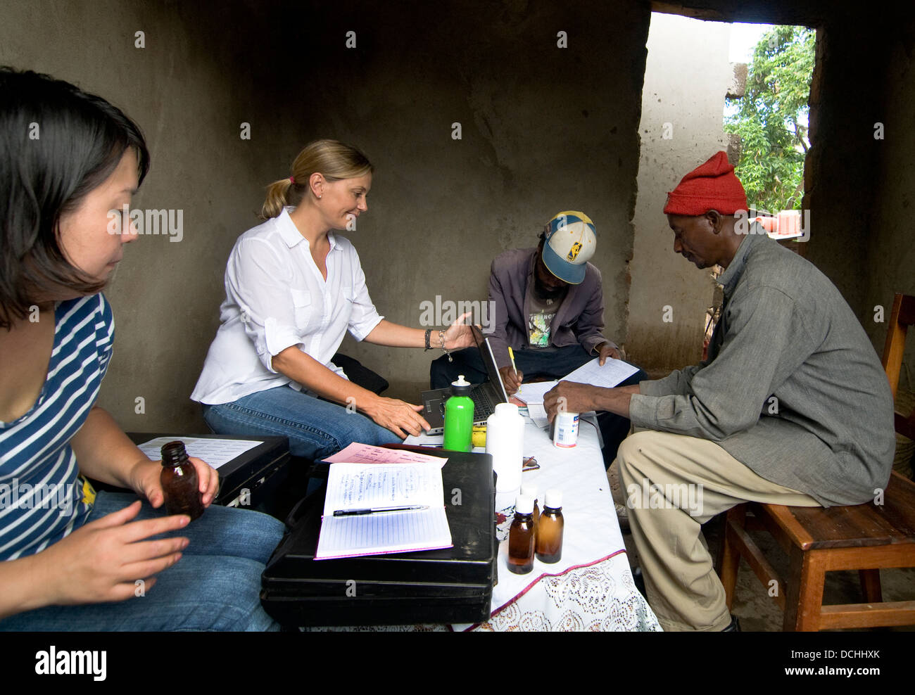 An European Homeopathic with a patient in a rural clinic in northern Tanzania. Stock Photo
