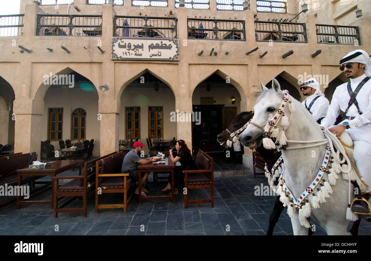 Proud Arab horsemen in Doha. Stock Photo
