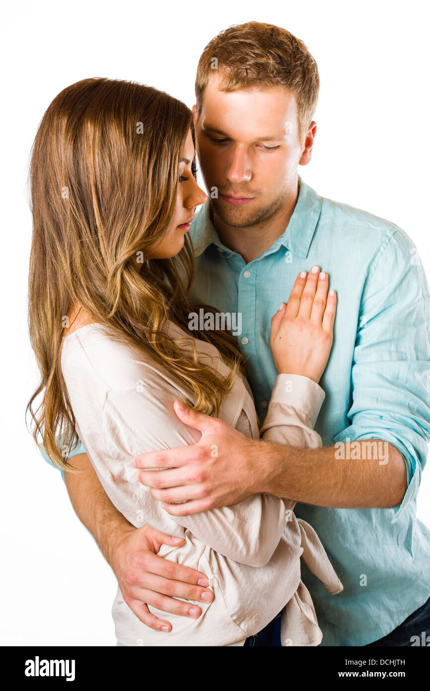 Lovely attractive couple together, studio shot, white background Stock