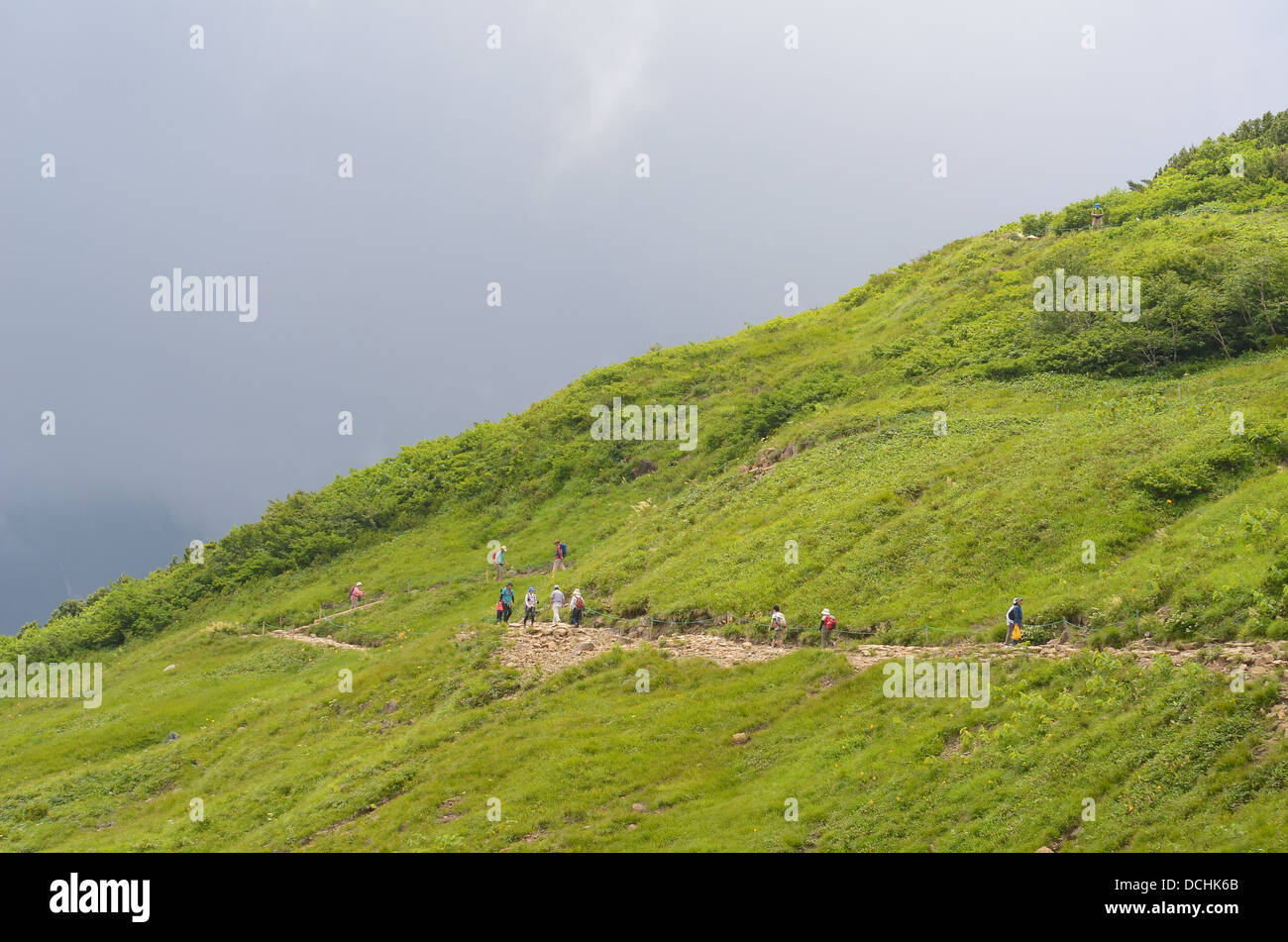 Hikers on Mount Happo near Hakubo in Nagano, Japan. Stock Photo