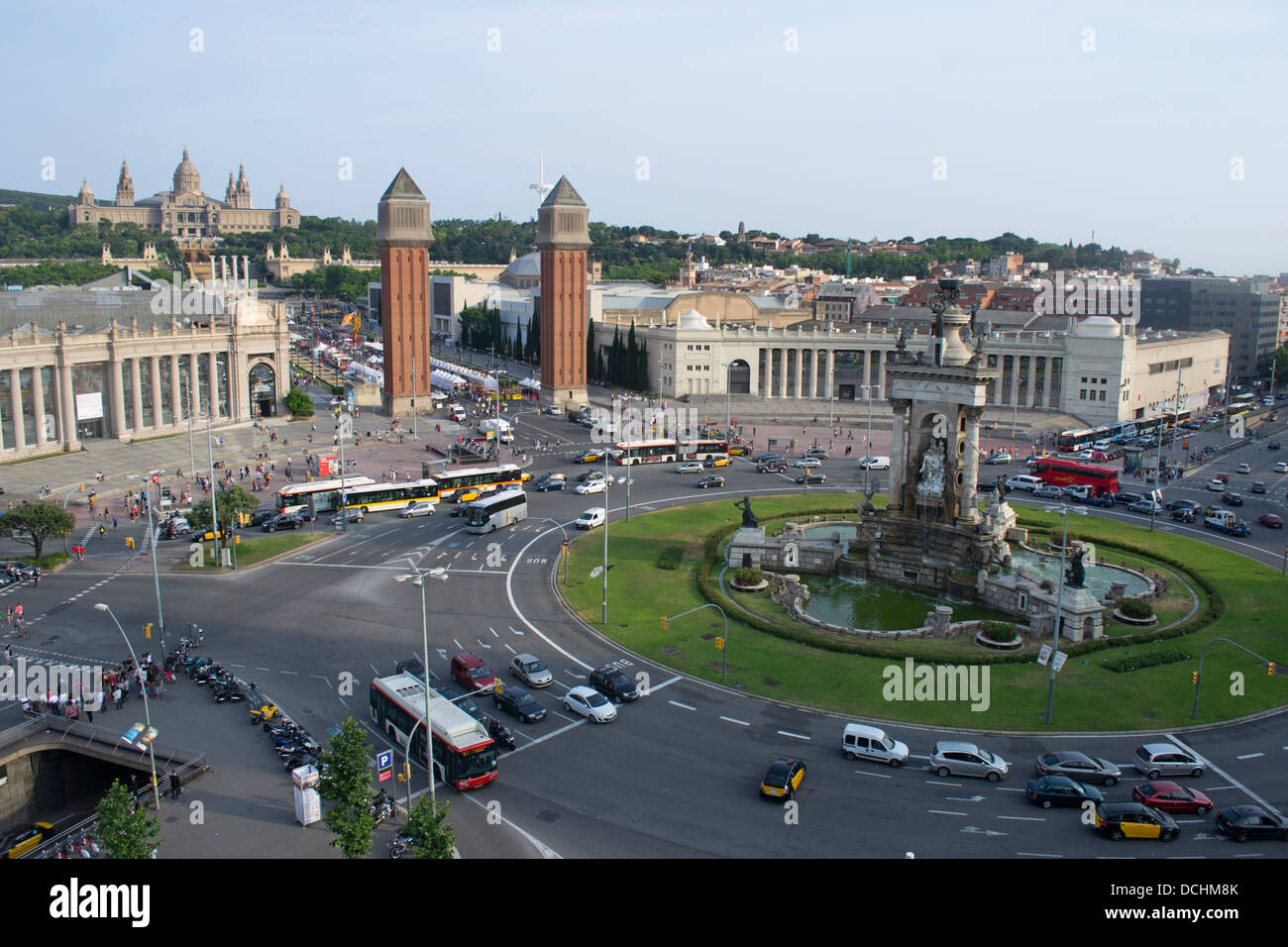 Traffic Roundabout with Venetian towers and the Palau Nacional in the Sants-Montjuic district, Barcelona, Catalonia, Spain. Stock Photo