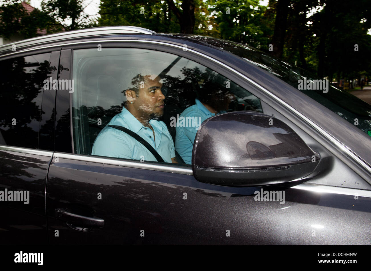 Munich, Germany. 19th Aug, 2013. FC Bayern Munich player Breno arrives on the premises of the Bundesliga soccer culb in Munich, Germany, 19 August 2013. Breno is said to work in the youth department of Bayern Munich in the course of a rehabilitation measure. Photo: PETER KNEFFEL/dpa/Alamy Live News Stock Photo