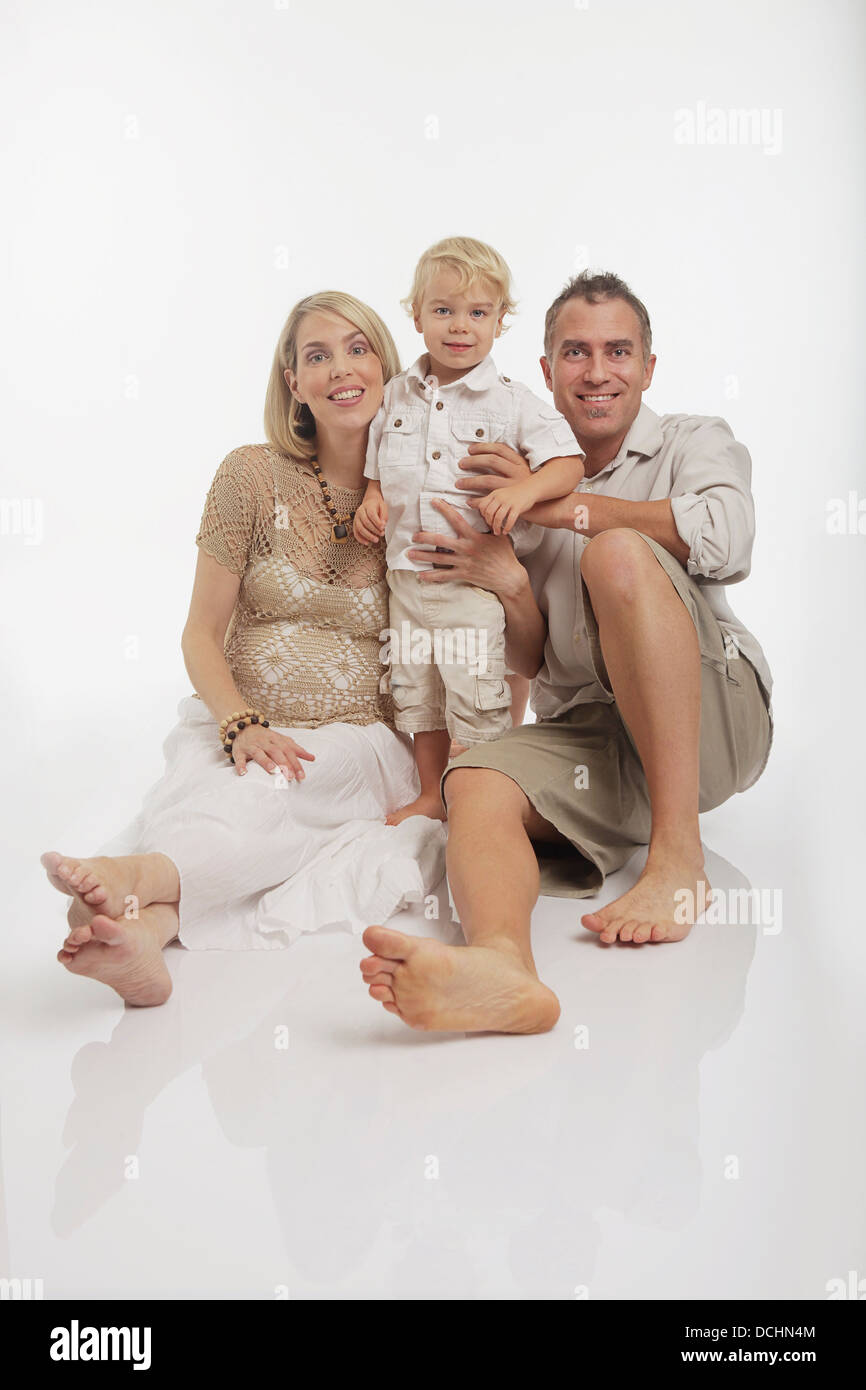 Family Of Three On A White Background Stock Photo