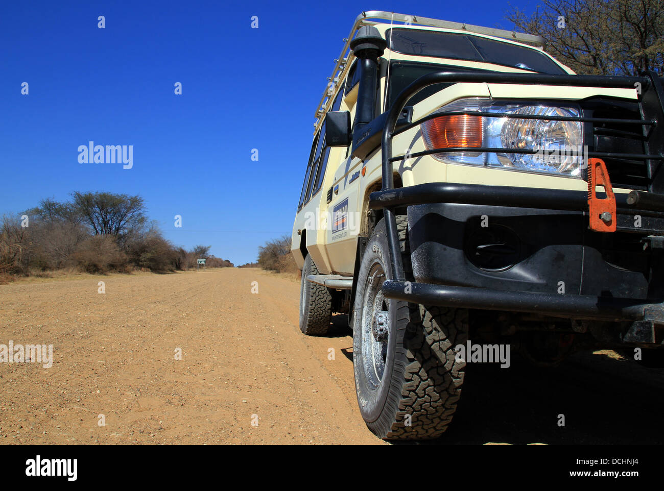 Safari Jeep on Sandy Road, Namibia Stock Photo
