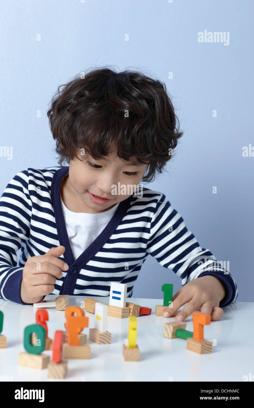 Asian cute boy playing toys hi-res stock photography and images - Alamy