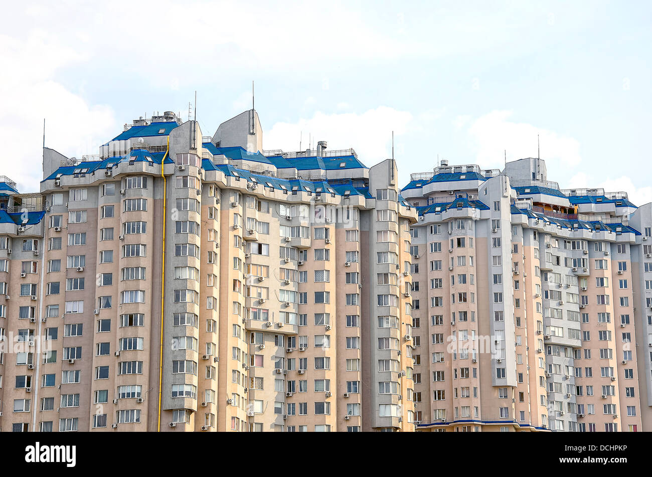 Multi-storey Residential Building with Modern Design and Green Color.  Action Stock Photo - Image of floor, house: 194167998