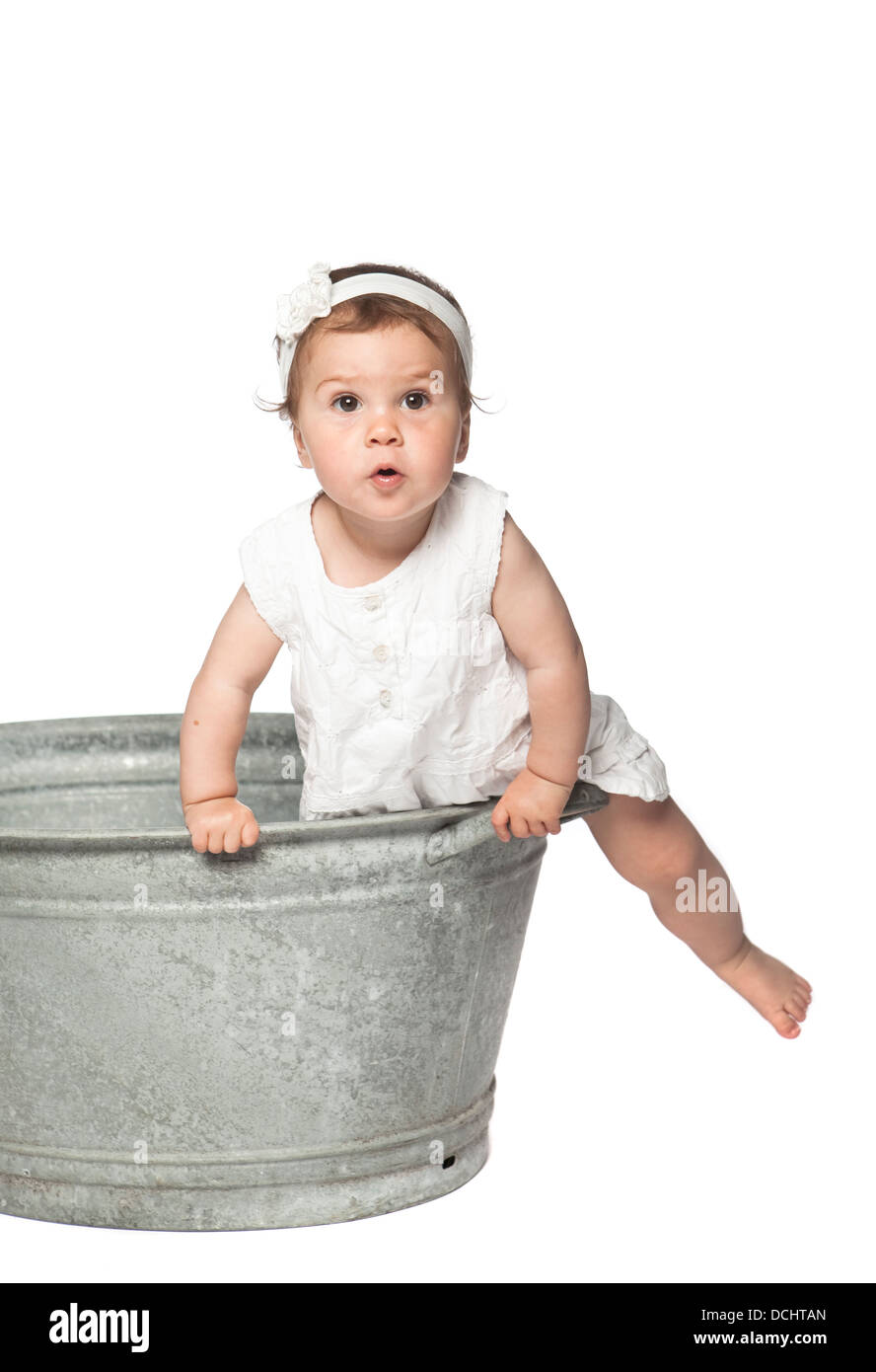 Baby in a bucket Stock Photo