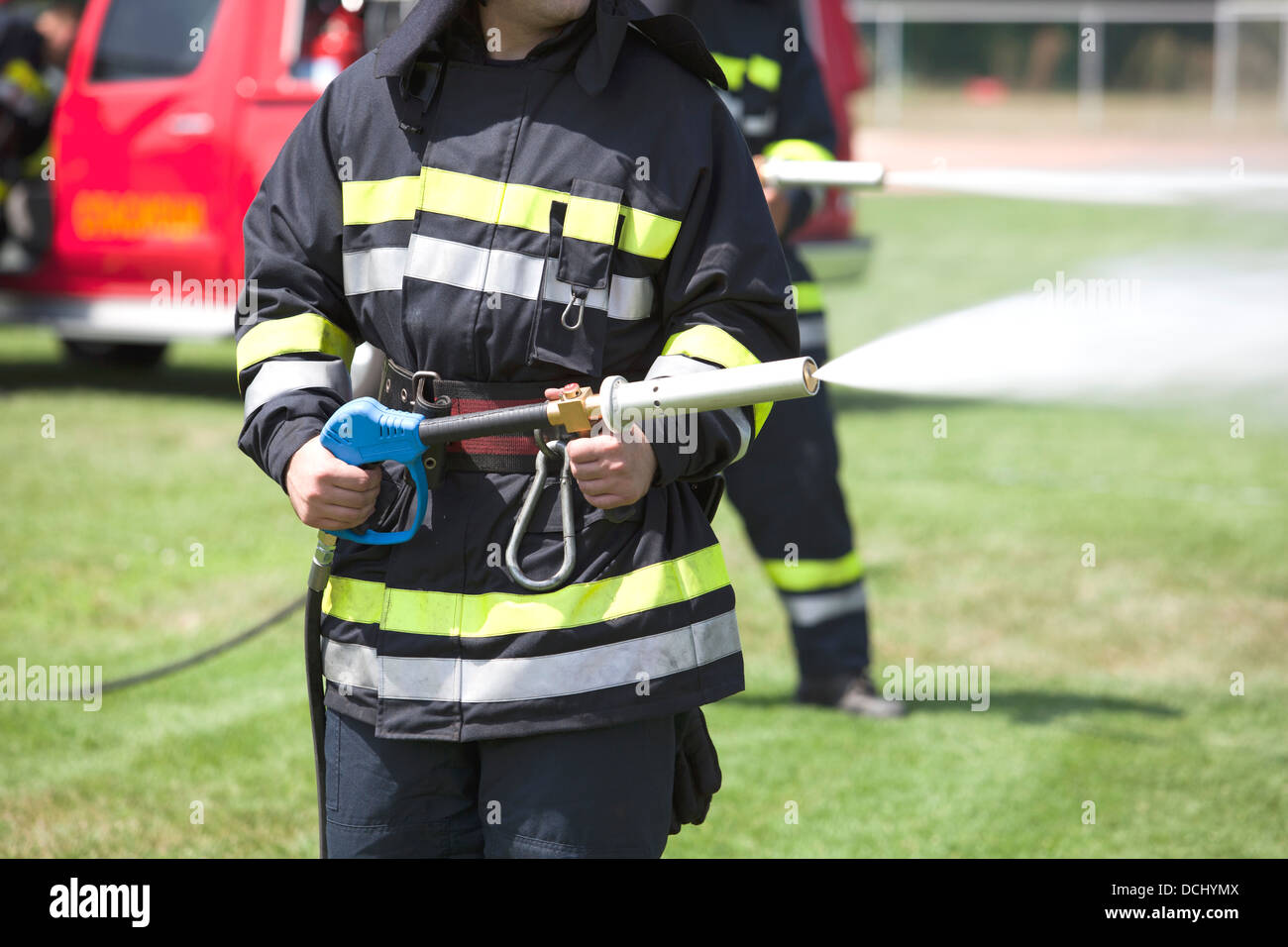 firefighters fighting fire during training Stock Photo Alamy