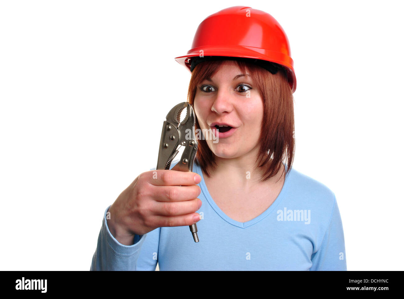 young woman holds a water pipe wrench Stock Photo Alamy