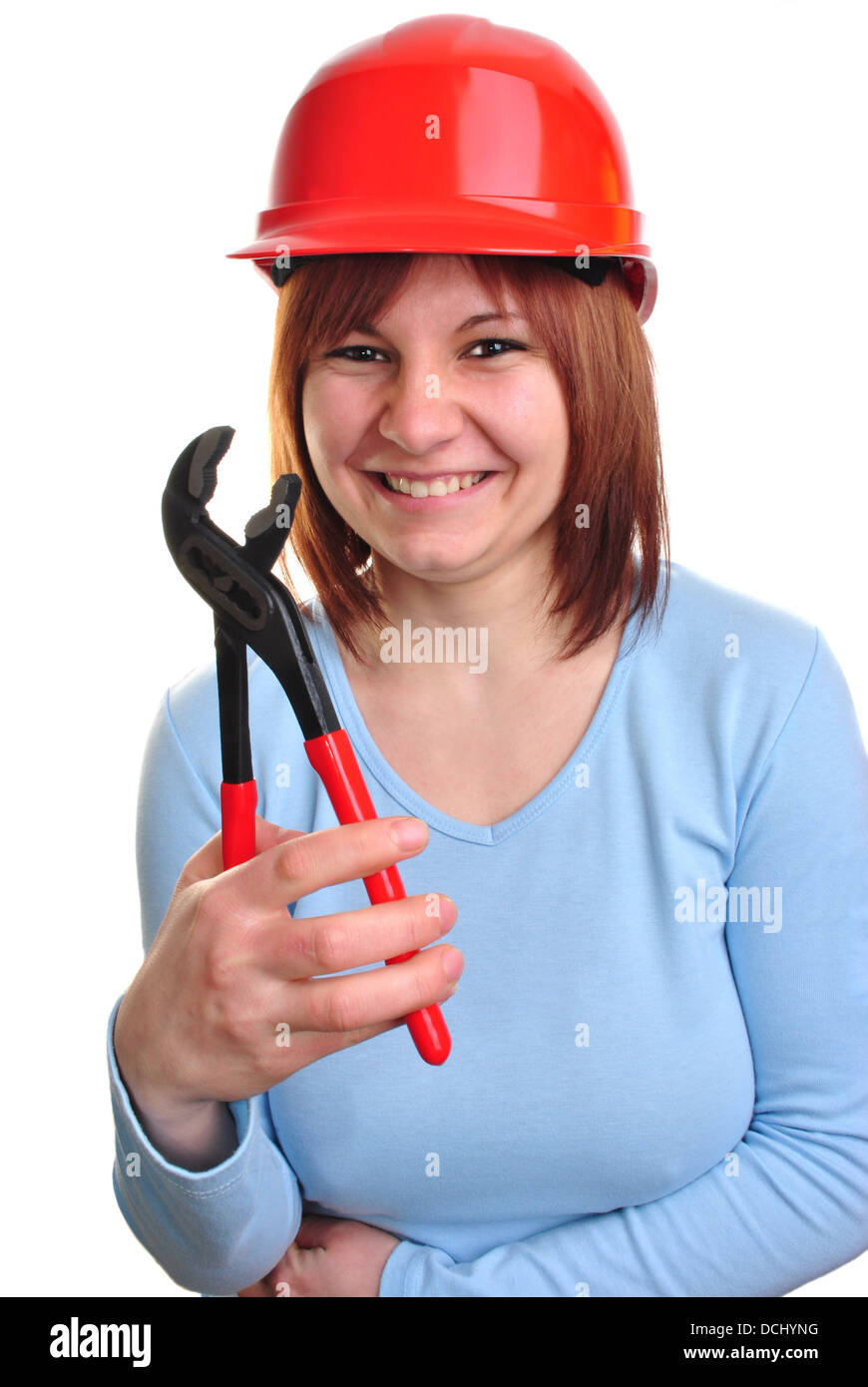 young woman holds a water pipe wrench Stock Photo Alamy
