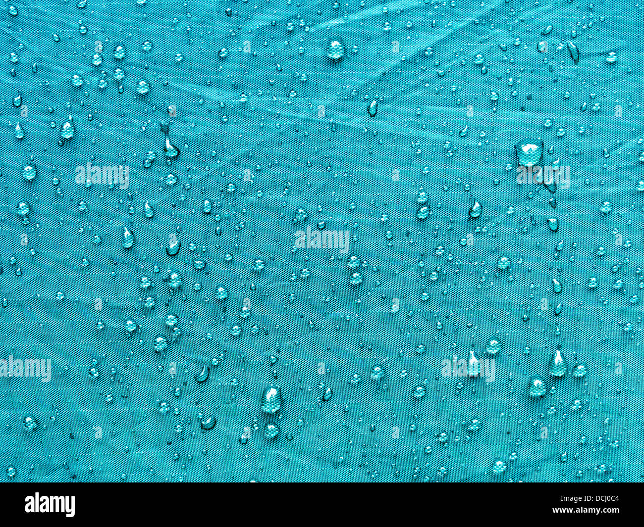many raindrops on the waterproof tent material Stock Photo