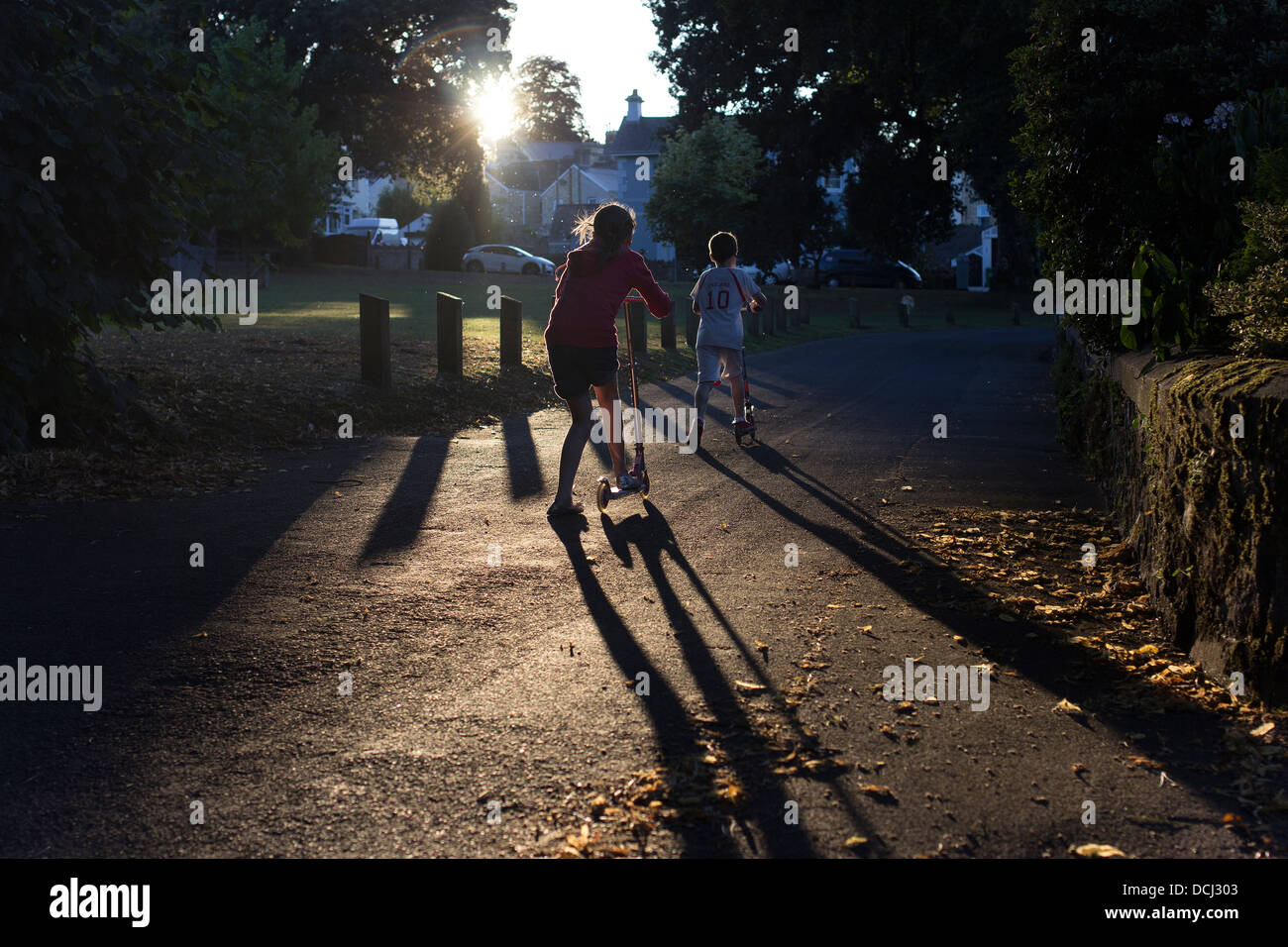 children on scooters, active, activity, background, balance, blue, child, culture, equipment, fun, game, girl, isolated, leisur Stock Photo