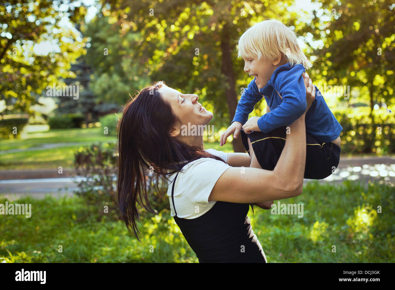 happy family, mother playing with son Stock Photo