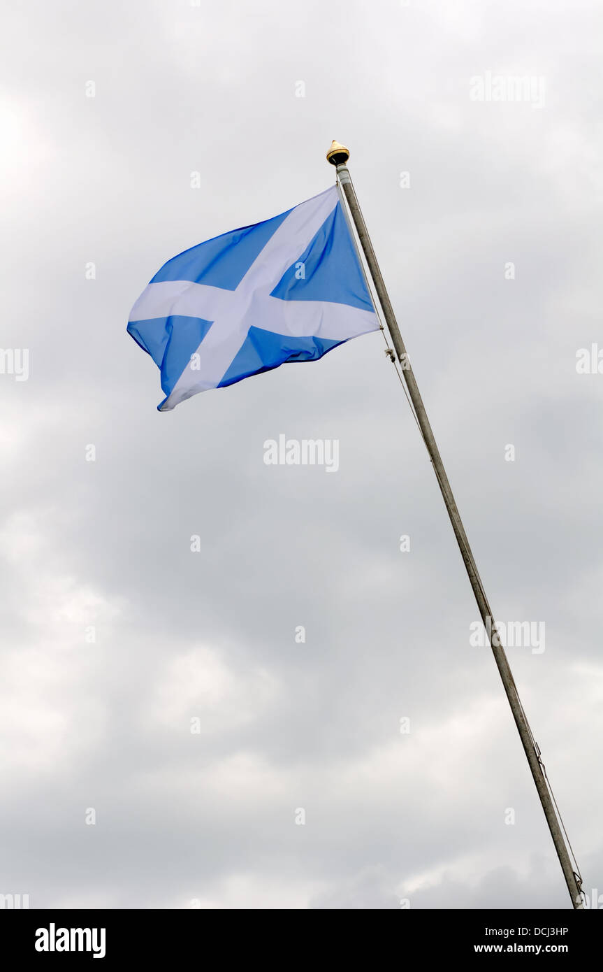 Scottish flag on tall pole Stock Photo