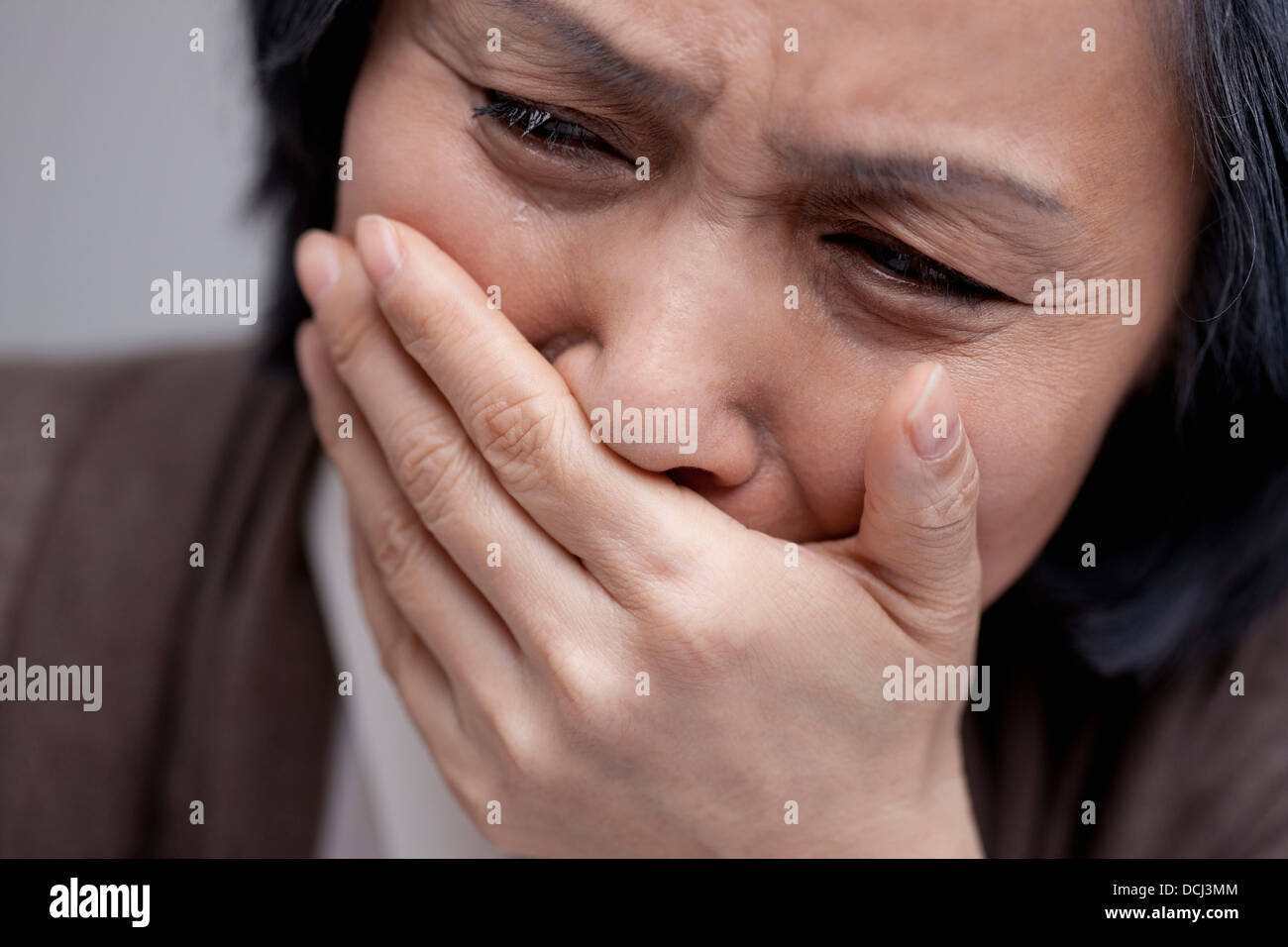 Close Up Shot Of Middle Aged Woman Crying Stock Photo Alamy