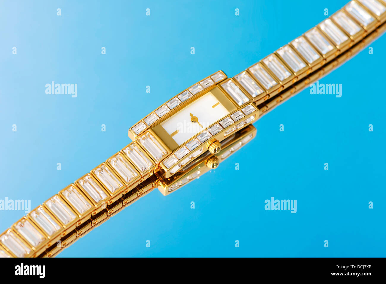 Cristal and gold watch Stock Photo Alamy