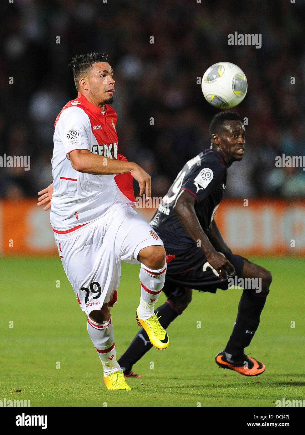 18.08.2013 Monaco. EMMANUEL RIVIERE and Maxime POUNDJE during the French Ligue 1 game between Monaco and Montpellier from the Stade Louis II stadium. Stock Photo