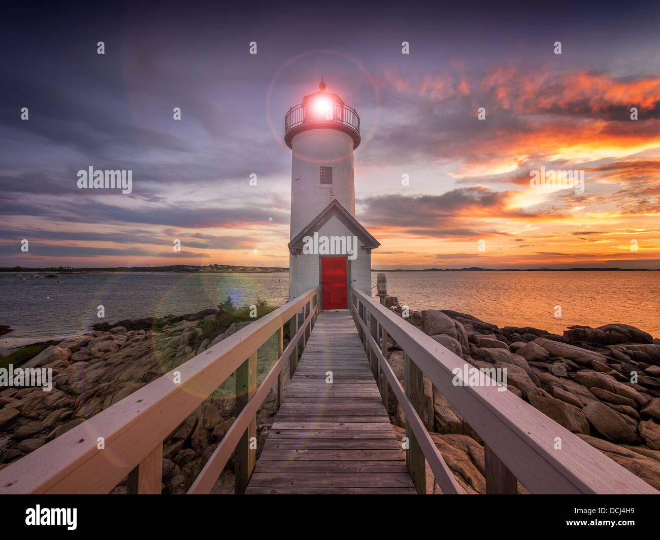 Annisquam lighthouse at sunset, located in Gloucester, Massachusetts, USA Stock Photo