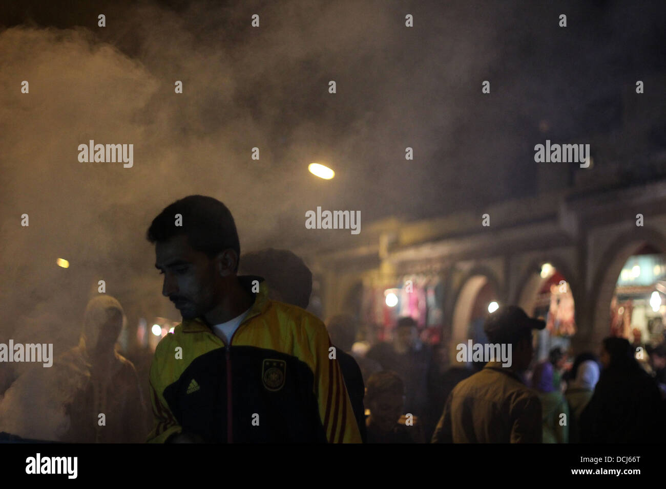 street vendor preparing food on a smoky night in essaouria, morocco. Stock Photo