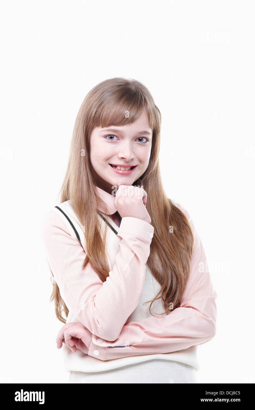 a student in uniform thinking on white background Stock Photo Alamy