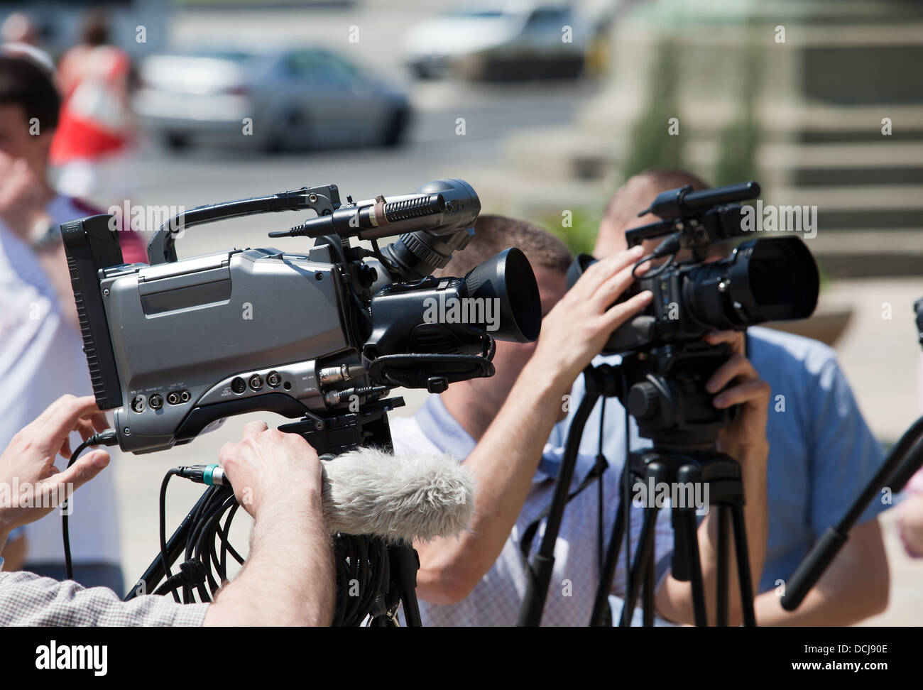 Camerman video camera people hand hi-res stock photography and images ...