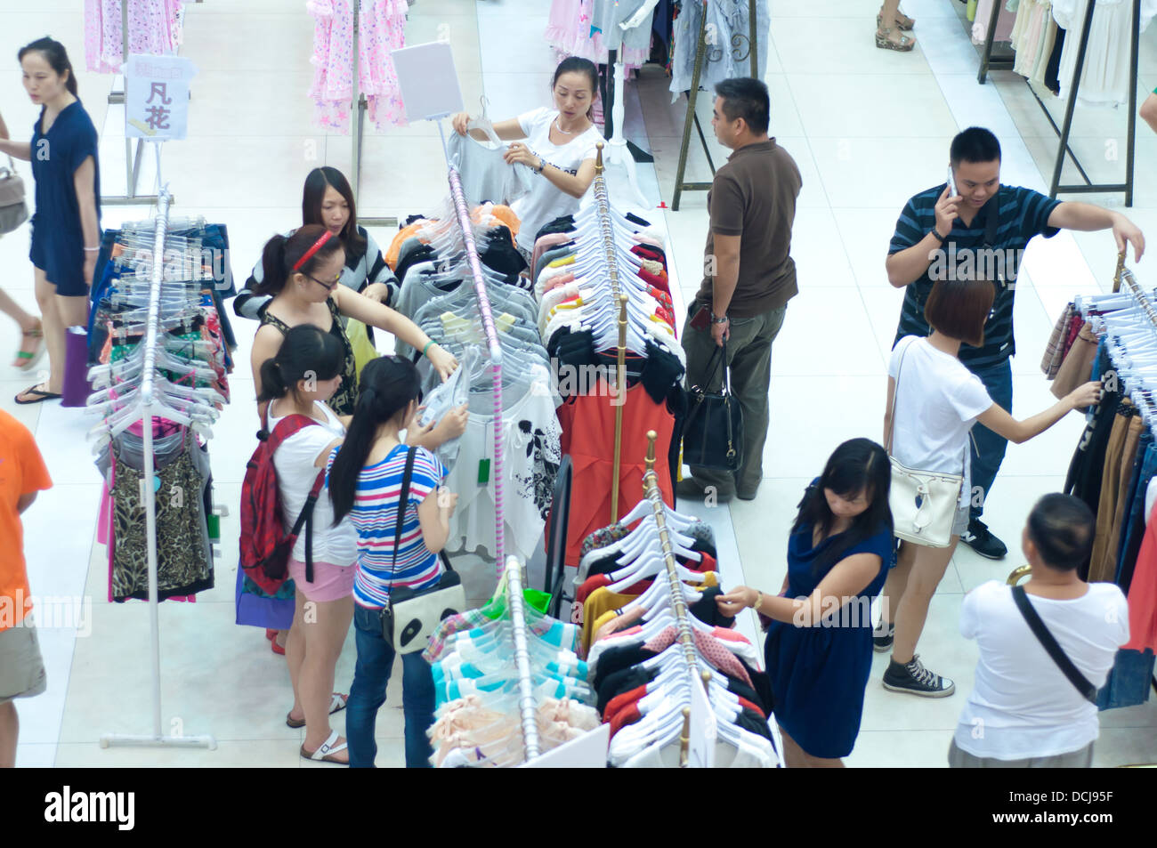 People shopping inside a mall Stock Photo