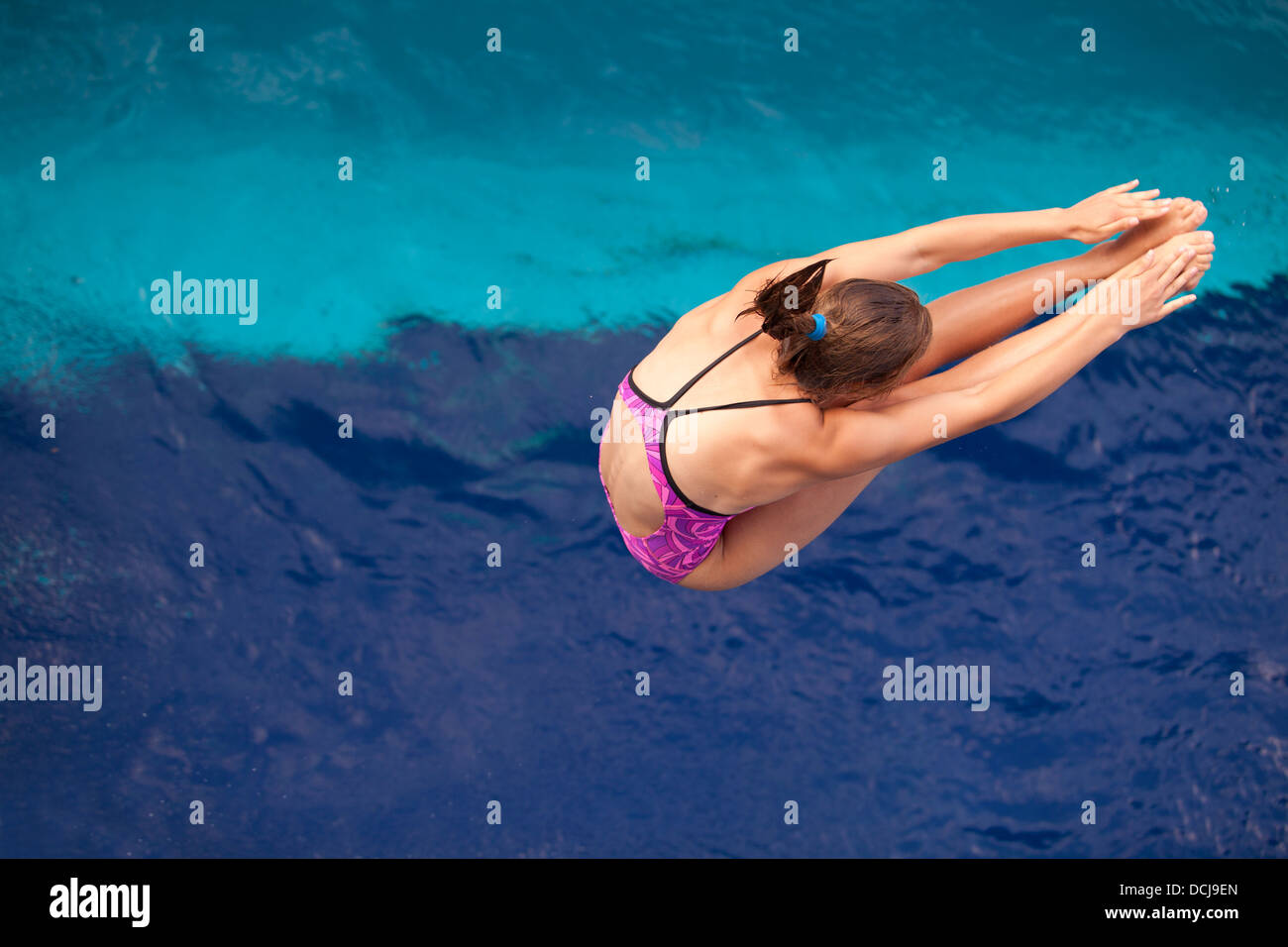 high diver jumping into the water Stock Photo Alamy