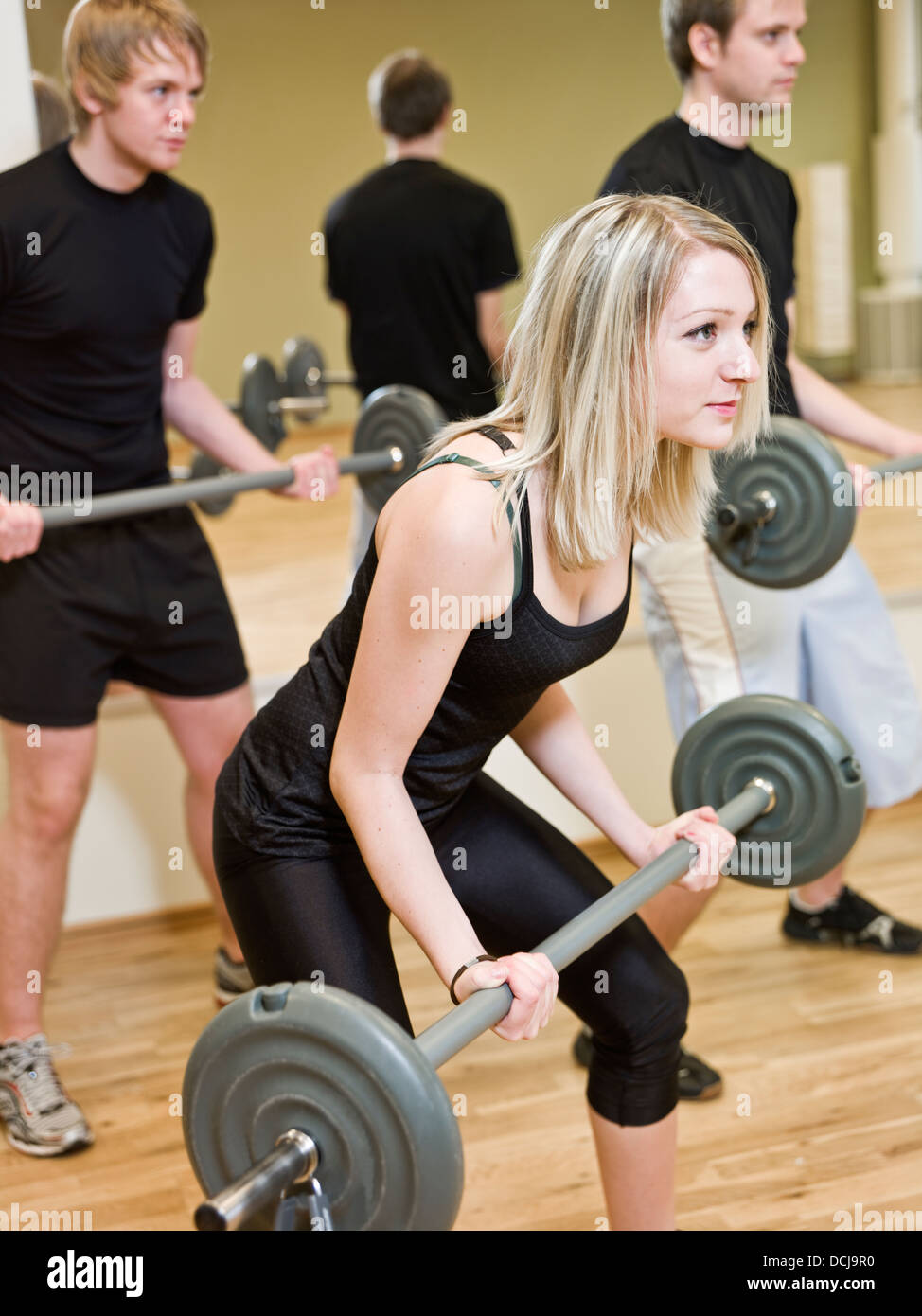 Girl lifting weights Stock Photo Alamy