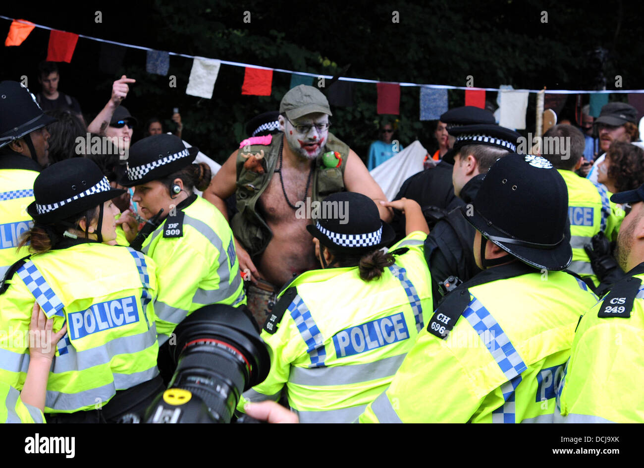 Balcombe West Sussex UK 19 August 2013 - Police clash with anti fracking protesters outside the Cuadrilla drilling site in Balcombe West Sussex today Stock Photo
