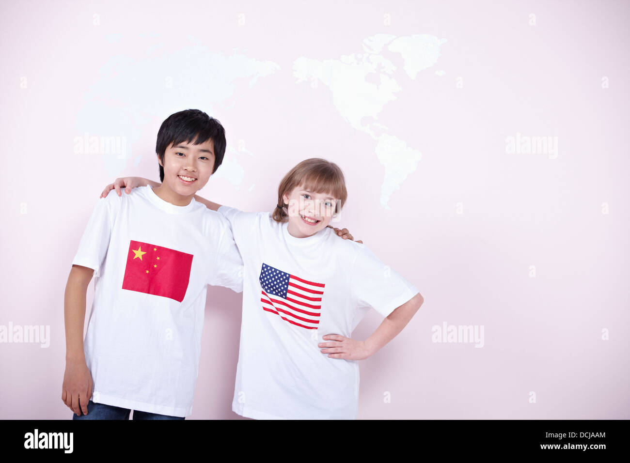 a boy and a girl with Chinese and American flags on their t-shirts ...