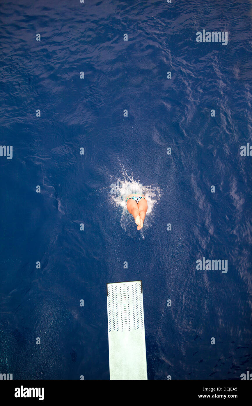 high diver jumping into the water Stock Photo Alamy