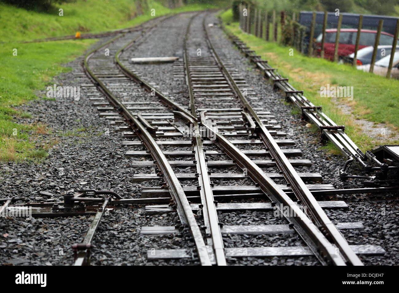 Tywyn, Wales, UK, Saturday, 17 August 2013  Pictured: Train track.  Re: Race the Train is an annual cross country running event that takes place in Tywyn, Mid Wales. The race is organised by Tywyn Rotary Club, and attracts runners from all over the world. In the main event, runners compete to beat a steam train on the preserved Talyllyn Railway over a distance of 14 miles (23 km).  The event was the idea of local dentist, Godfrey Worsey, and was first run in 1984 with around 48 runners. © D Legakis/Alamy Live News Stock Photo