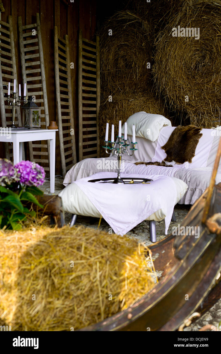 Romantic countryside farm in Estonia with candles and flowers Stock Photo