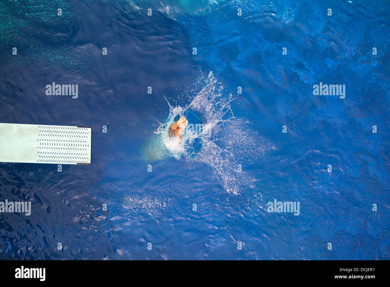 high diver jumping into the water Stock Photo Alamy
