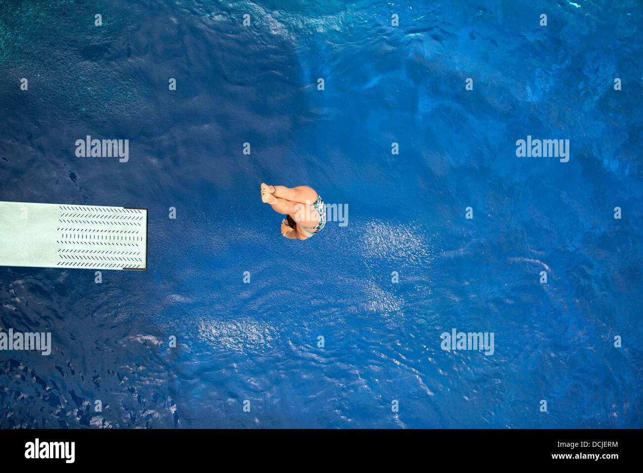 high diver jumping into the water Stock Photo Alamy