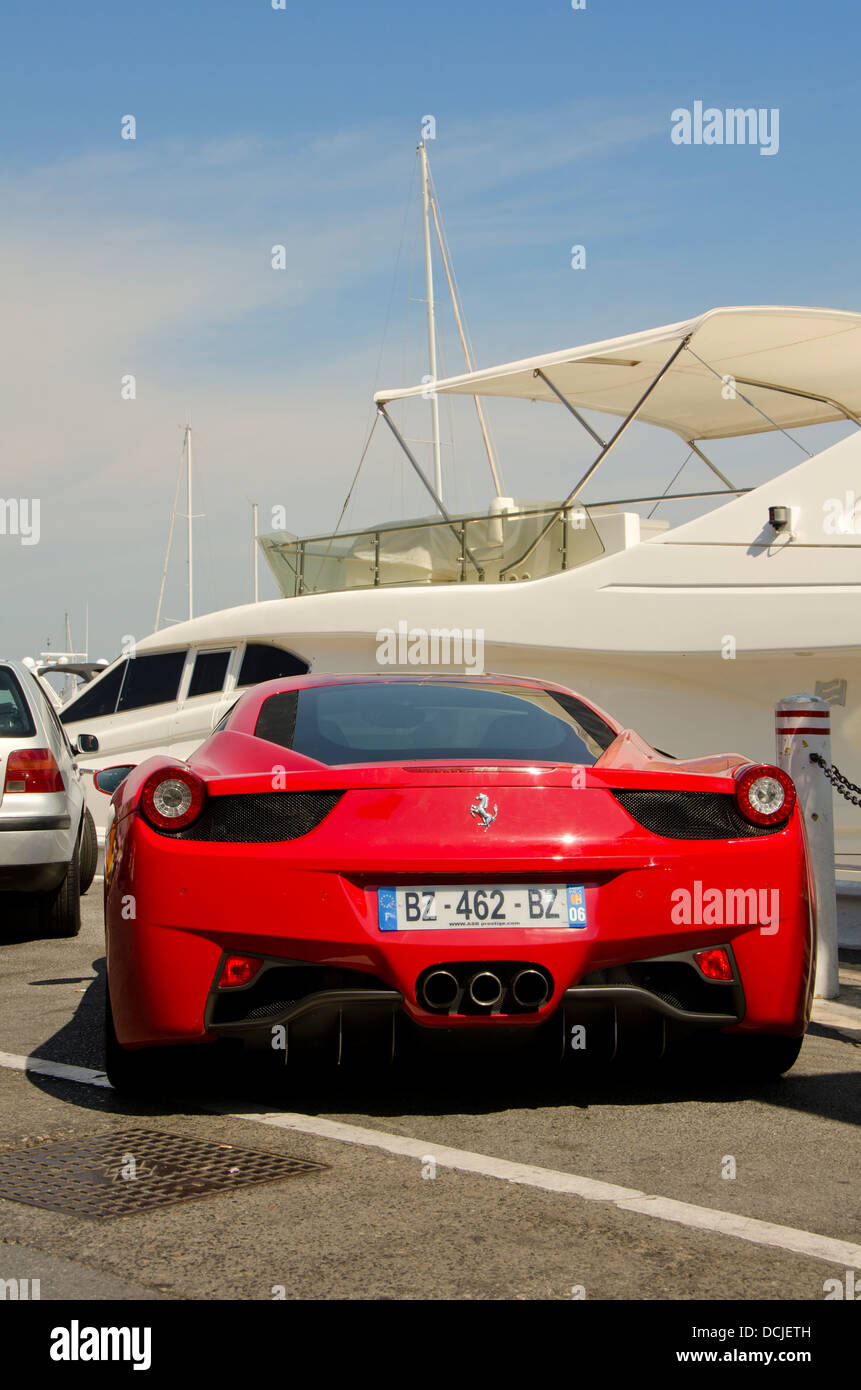 Ferrari 458 Italia parked in front of a yacht in Puerto banus, Marbella,  Spain Stock Photo - Alamy