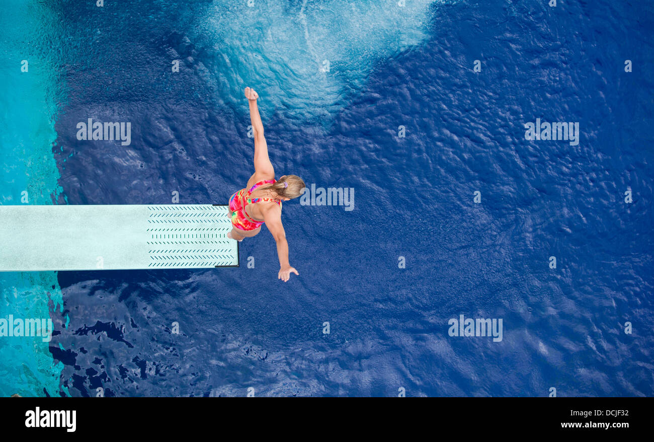 high diver jumping into the water Stock Photo Alamy