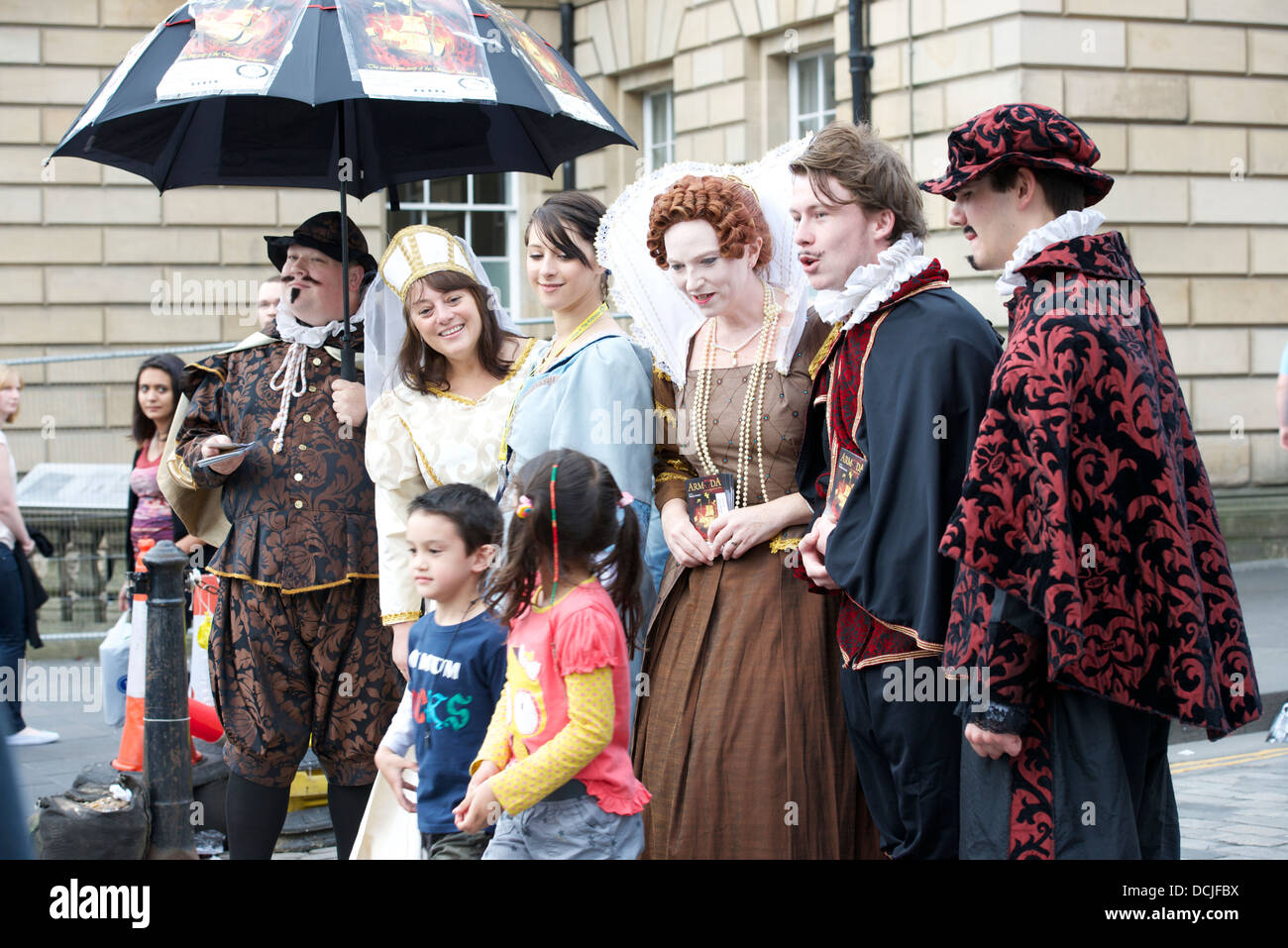 The cast of Armada pose with children and drum up interest on the High Street, Edinburgh Stock