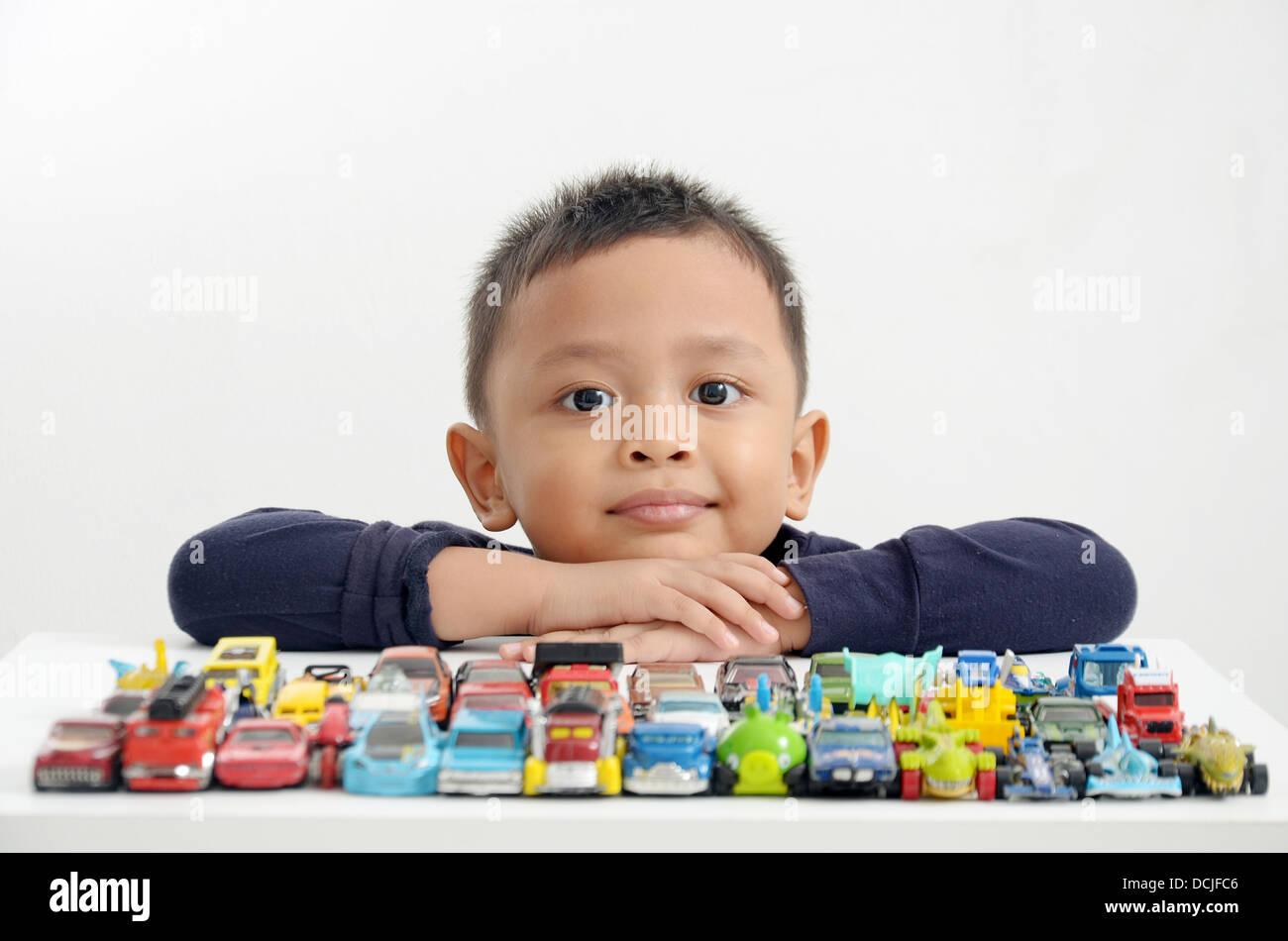 Kid playing car toys Stock Photo Alamy